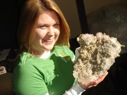 Mandy holding Ajoite included Quartz Cluster from Messina, South Africa